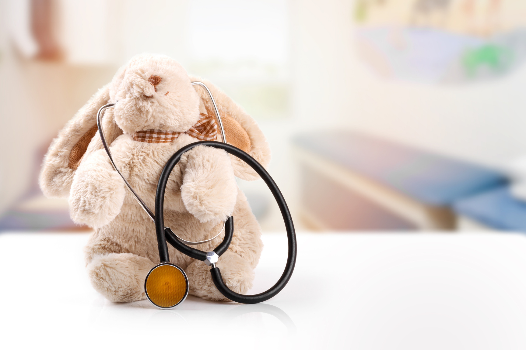 children doctor concept - rabbit with stethoscope. copy space